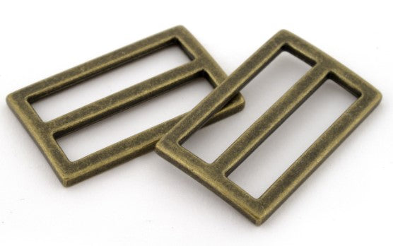 Flat tri-glides  1 1/2" Antique brass colour