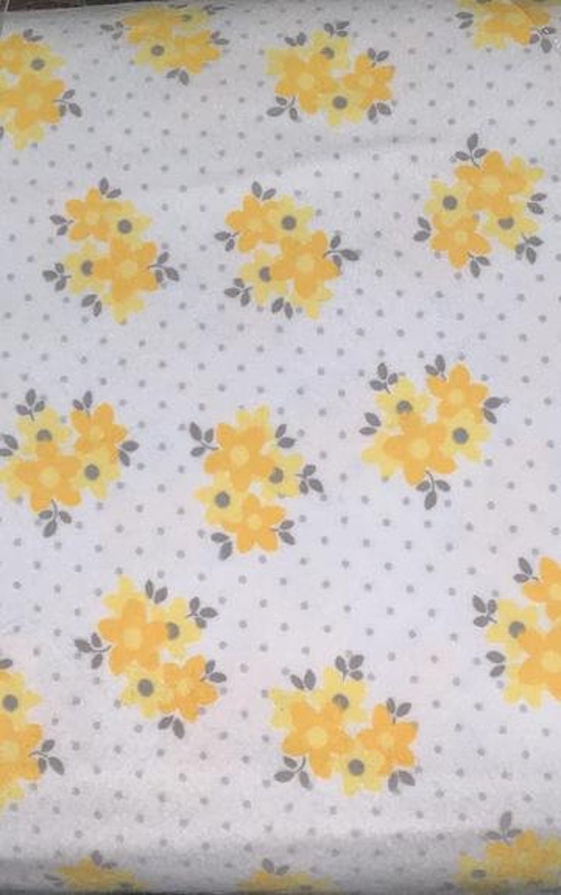 White background with grey dots and yellow flowers- Flannel